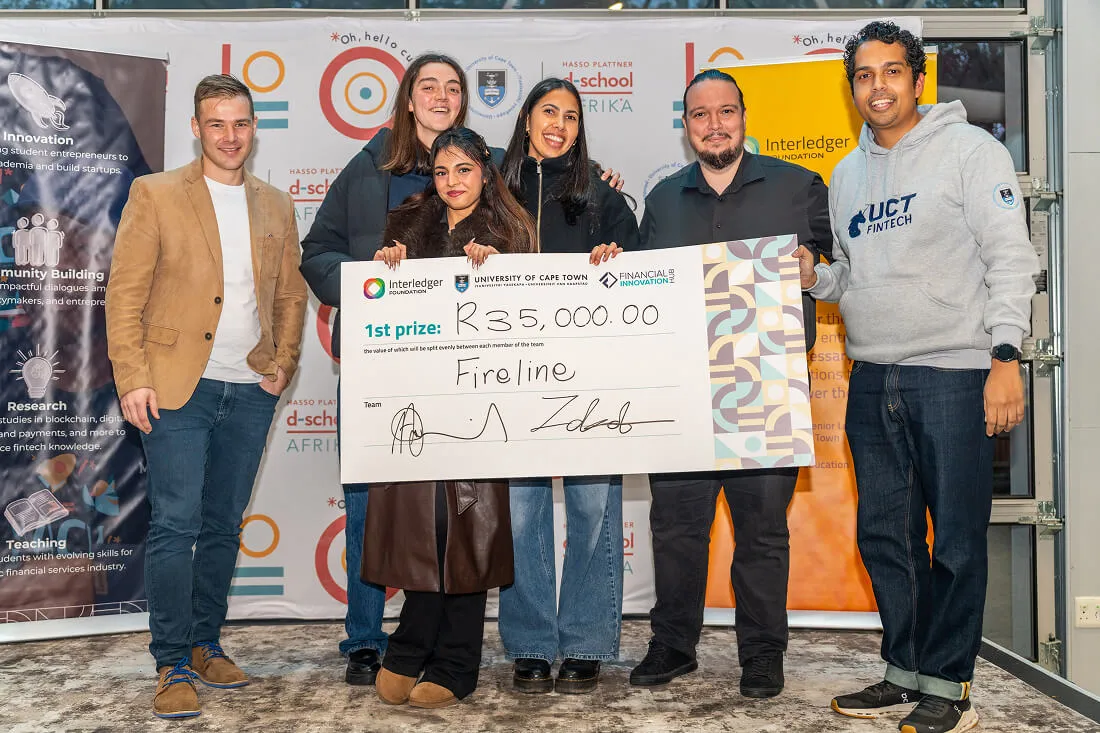 The all-women Fireline team holding their first-place prize cheque at the 2026 student hackathon at the university of Cape Town