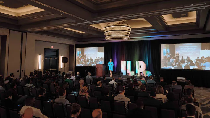 Briana Marbury on stage at the 2022 Interledger Summit